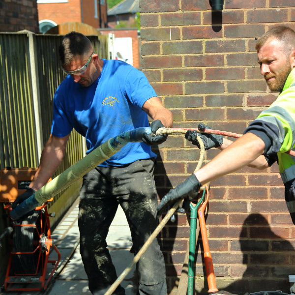 A drain lining project being undertaken by two drain specialists