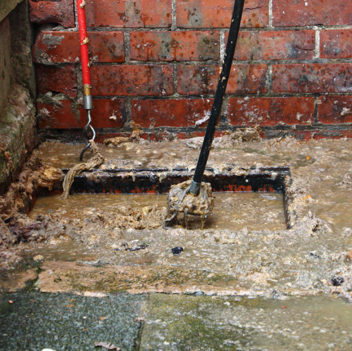 A clogged drain that needs a drain unblocker to unclog it